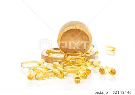 Golden fish oil isolated on white 62145446