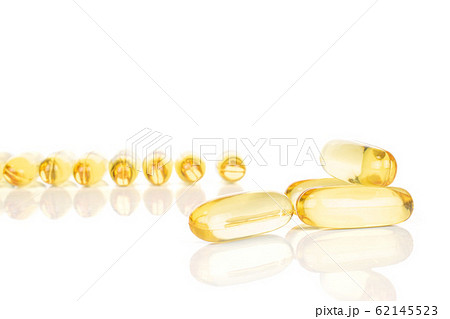 Golden fish oil isolated on white 62145523