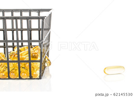 Golden fish oil isolated on white 62145530