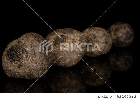 Raw sweet beetroot isolated on black glass 62145532