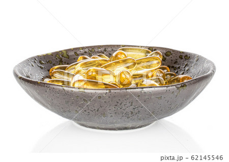 Golden fish oil isolated on white 62145546