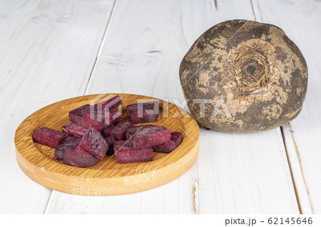 Raw sweet beetroot on grey wood 62145646