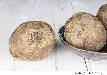 Raw sweet beetroot on grey wood 62145876