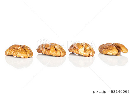 Brown pecan nut isolated on white Brown pecan nut isolated on white 62146062