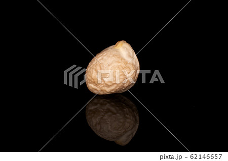 Fresh tan chickpea isolated on black glass 62146657