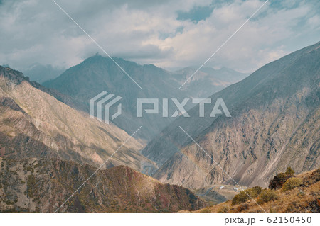 mountains and cloudy skies mountains and cloudy skies 62150450