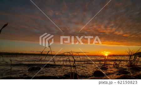 Beautiful lake in Karelia on sunset Beautiful lake in Karelia on sunset 62150823