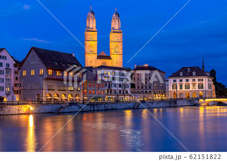 Zurich. View of the city embankment and the church Grossmunster at sunset. Zurich. View of the city embankment and the church Grossmunster at sunset. 62151822