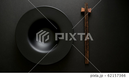 Top view of chop stick and empty plate 62157366