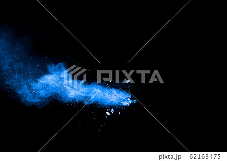 Blue color dust particles explosion cloud on black background.Color powder splash. 62163475