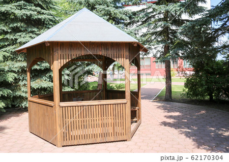 Wooden brown pavilion for rest 62170304