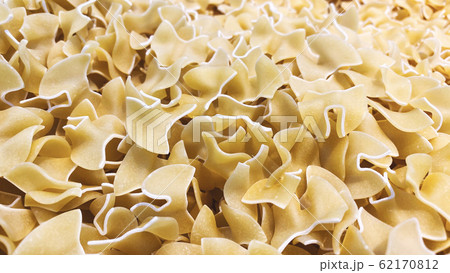 Variety of types and shapes of Italian pasta. Variety of types and shapes of Italian pasta. 62170812