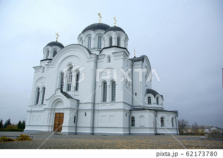 A large white stone church with a golden A large white stone church with a golden 62173780