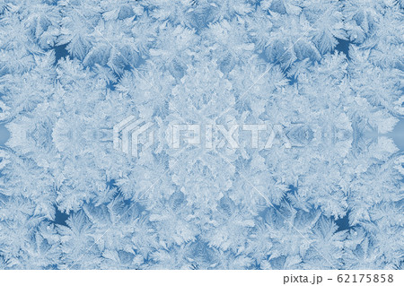 Kaleidoscope of frosty patterns in trendy 2020 Classic Blue. Collage. Christmas or New Year festive background or wallpapers. 62175858