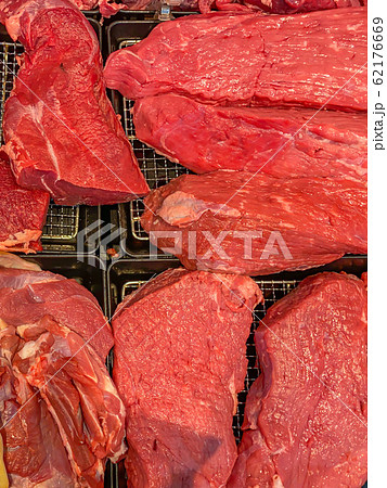 Closeup photo of fresh red beef meat at supermarket 62176669