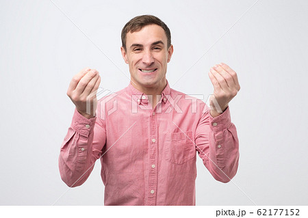 Young handsome man showing italian gesture that means what do you want 62177152