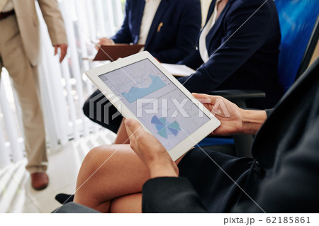 Tablet computer with financial chart 62185861