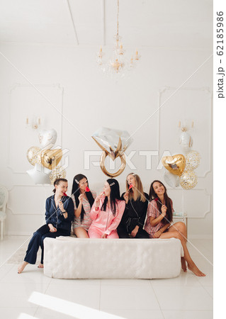 Girlfriends celebrating bachelorette party. Stock 62185986