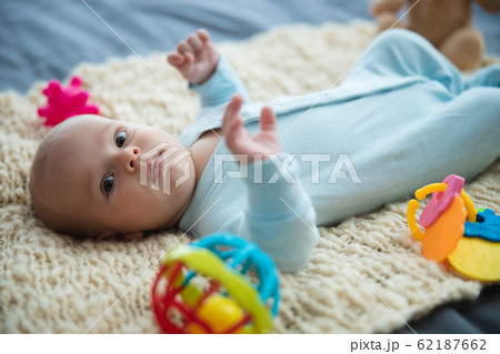 Baby in pajama looking cute and curious stock photo 62187662