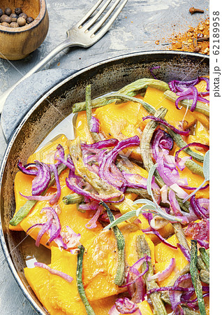 Baked pumpkin with vegetables 62189958