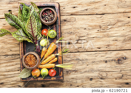 Fresh vegetables on wooden table 62190721
