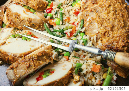 Baked meat and risotto 62191505