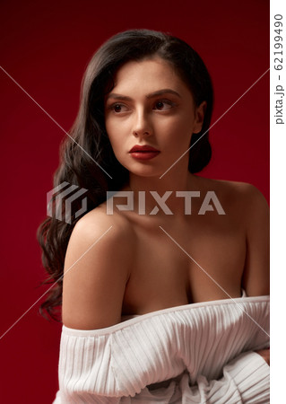 Portrait of model posing in sweater. Portrait of model posing in sweater. 62199490