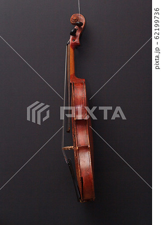 Broken antique red violin for restoration with damage 62199736