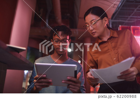 Young Business People in Futuristic Interior Young Business People in Futuristic Interior 62200988