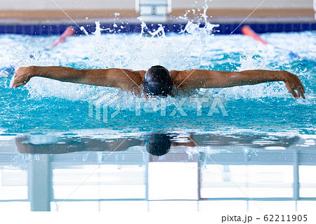 Swimmer swimming in the pool Swimmer swimming in the pool 62211905