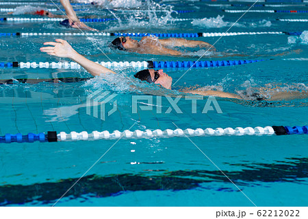 Swimmers swimming in the pool 62212022