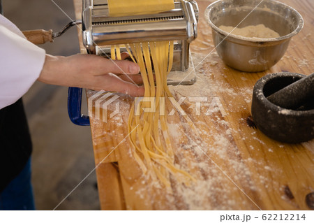 Caucasian chef making pasta Caucasian chef making pasta 62212214