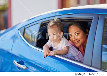 Young mom with baby girl 62214809