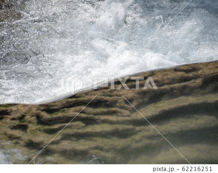 Water fall in spring season located in deep rain Water fall in spring season located in deep rain 62216251