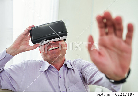 Man playing vr game Man playing vr game 62217197