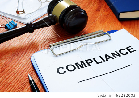 Compliance form and gavel in the court. 62222003