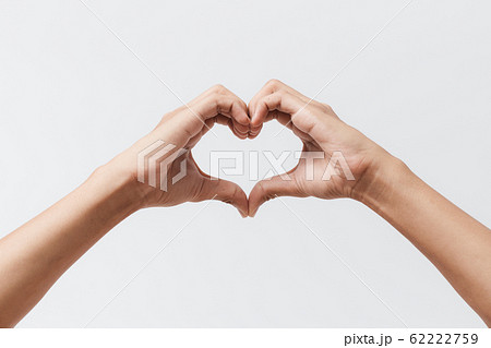 Man hands making a heart shape on a white isolated Man hands making a heart shape on a white isolated 62222759