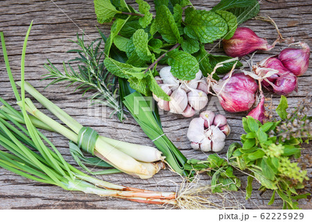 Natural fresh herbs and spice on rustic wood 62225929