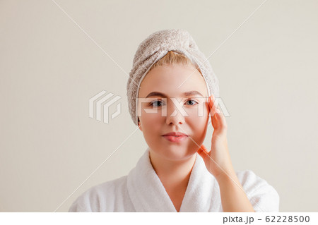 Beauty model with healthy clean skin in bathroom, close up 62228500