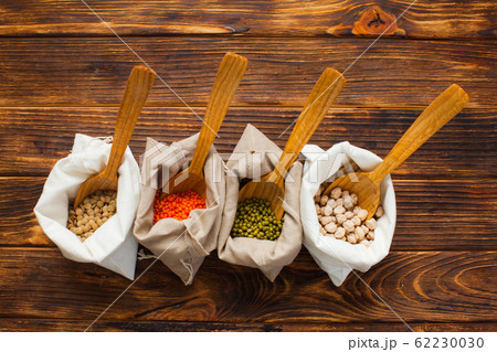 Eco pouches with chickpeas, beans, lentils, mash, top view. Zero waste concept. Eco pouches with chickpeas, beans, lentils, mash, top view. Zero waste concept. 62230030