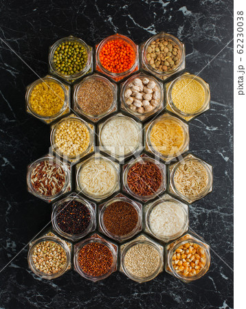 Top view of hexagon jars with cereals and beans 62230038