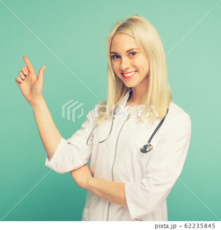 Portrait of an attractive young female doctor in 62235845