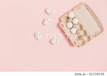 Eggs on a pink background. Eggs on a pink background. 62238289