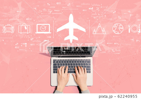 Flight ticket booking concept with person using laptop Flight ticket booking concept with person using laptop 62240955