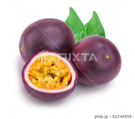 Two whole passion fruits with leaves and a half isolated on white background. Isolated maracuya Two whole passion fruits with leaves and a half isolated on white background. Isolated maracuya 62240956