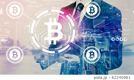 Bitcoin theme with businessman holding a tablet 62240961
