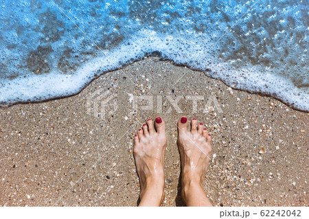close up leg on the summer beach 62242042