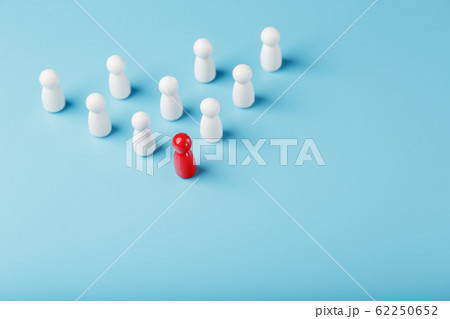 The leader in red leads a group of white employees 62250652