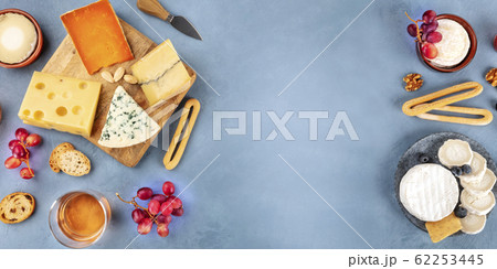 Cheese panorama. Goat cheese, Brie, blue cheese etc, shot from above with a place for text Cheese panorama. Goat cheese, Brie, blue cheese etc, shot from above with a place for text 62253445