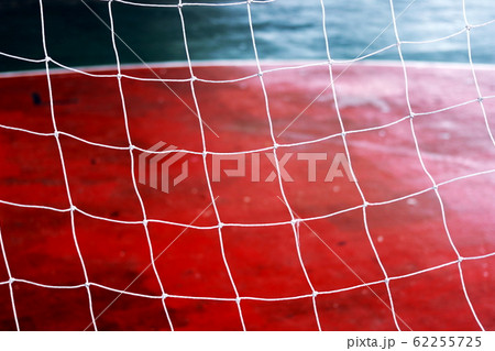 Football net and field football.Red Siemens and net on gate football. Football net and field football.Red Siemens and net on gate football. 62255725